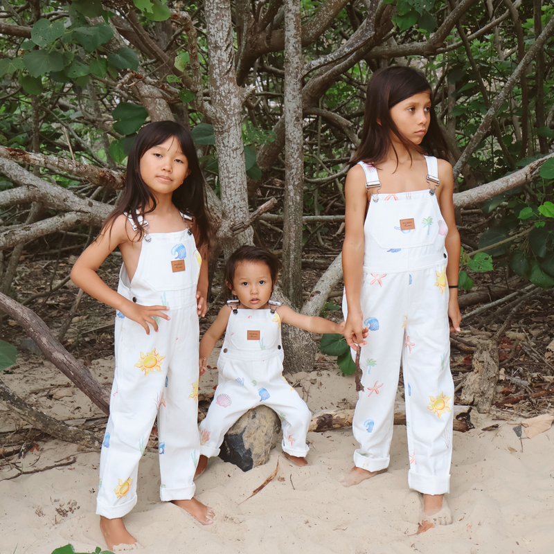 three kids wearing the summer tides overalls