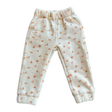 Cream Sun Dance Track pants with brown print